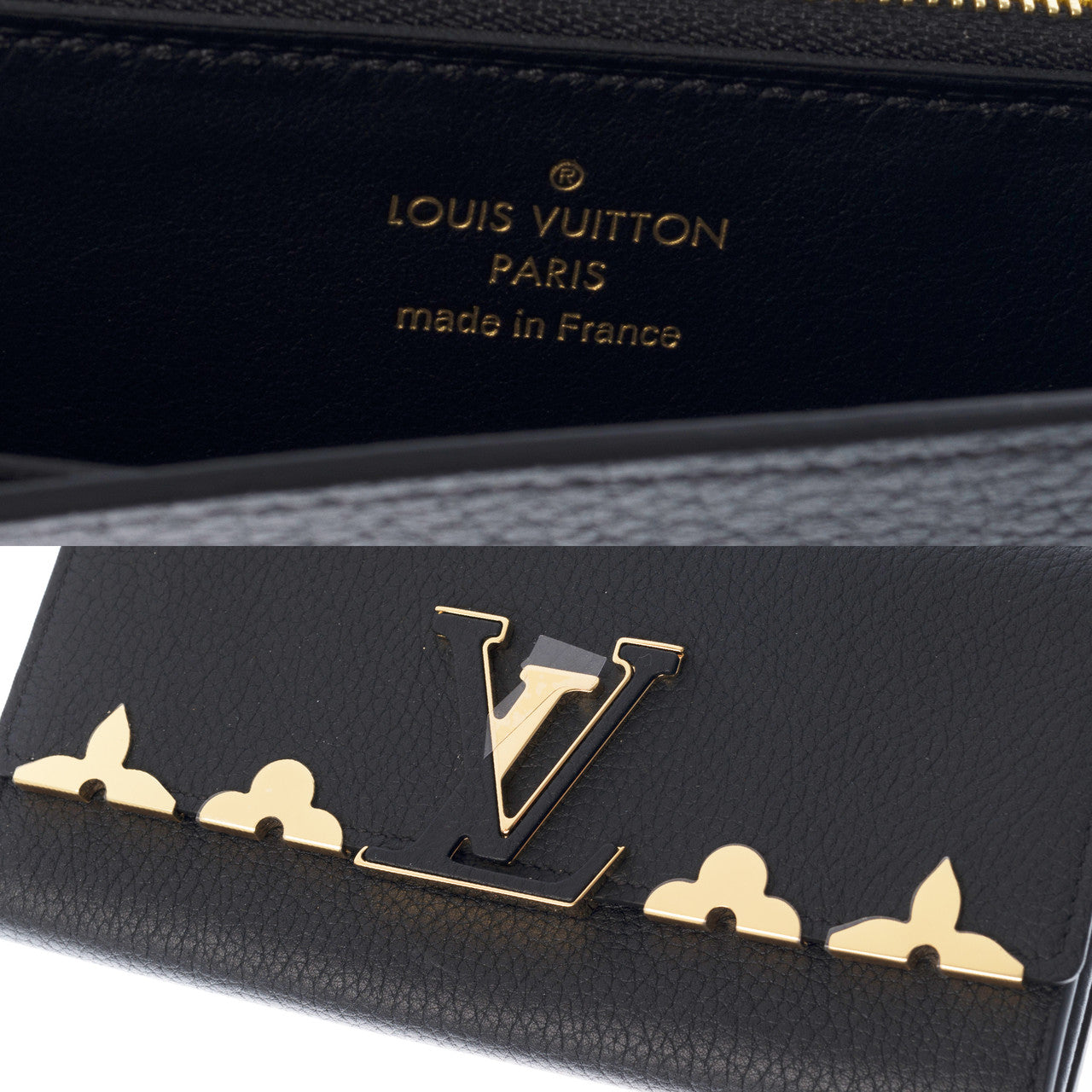 portefeuille LOUIS VUITTON capucines en cuir taurillon- 100479